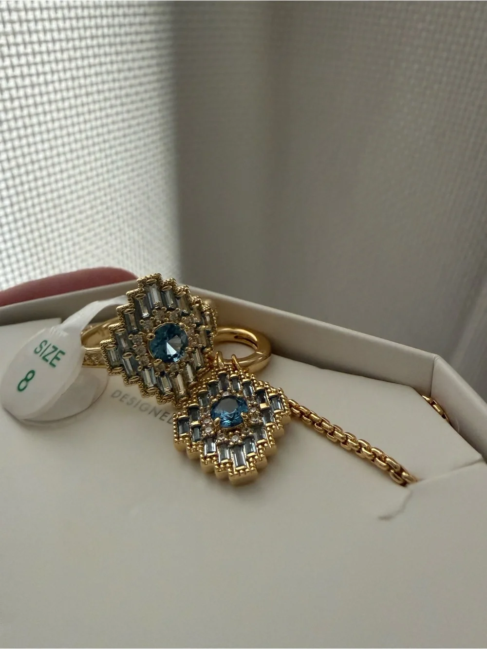 Bomb Party Gold-Tone Necklace and Ring Set with Blue Crystal Accents